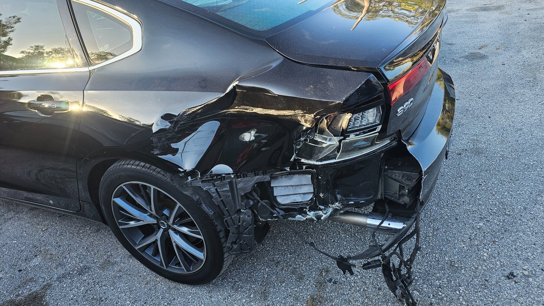 BMW with rear collision damage before repair