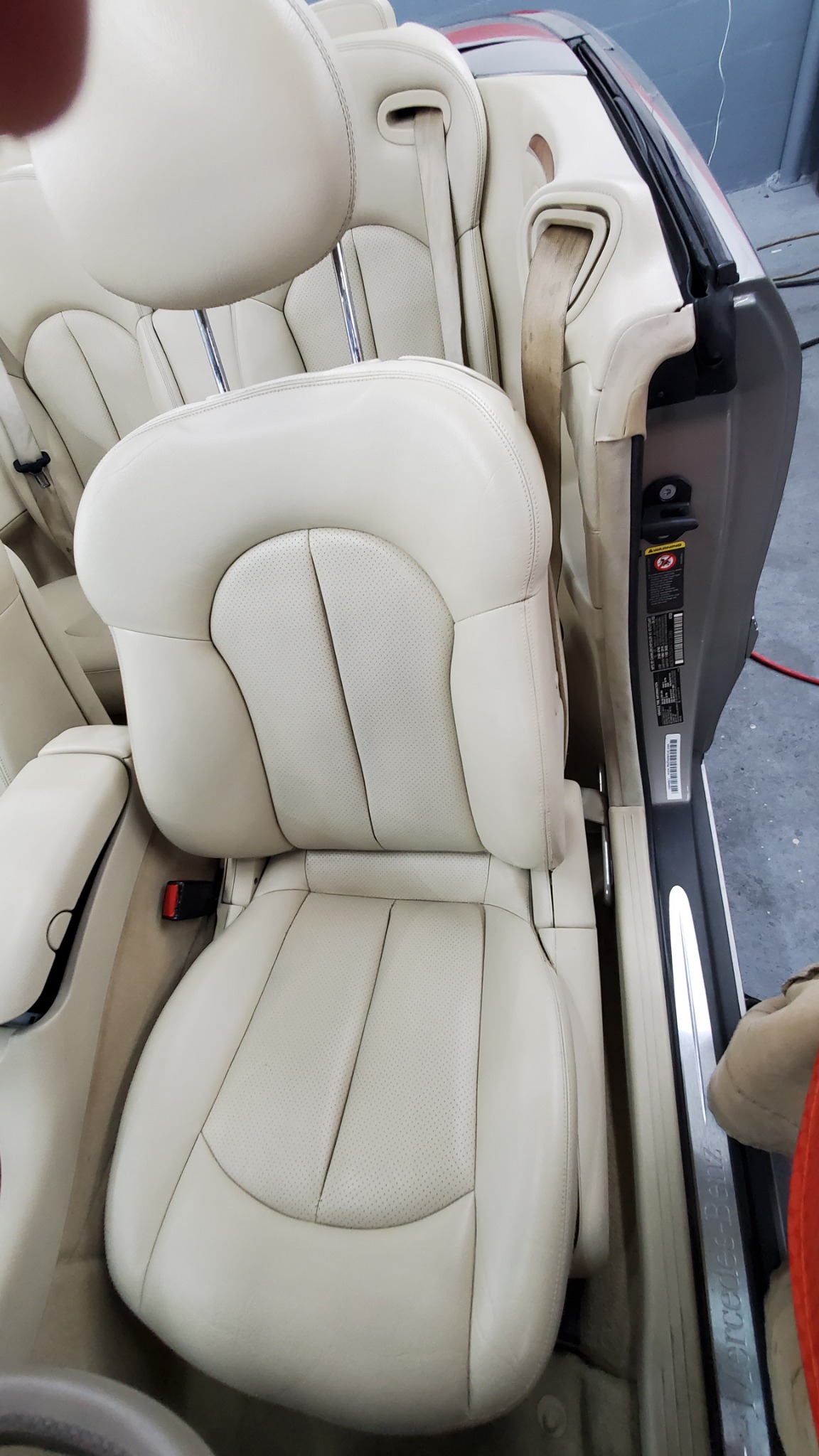 Light leather front seat after restoration